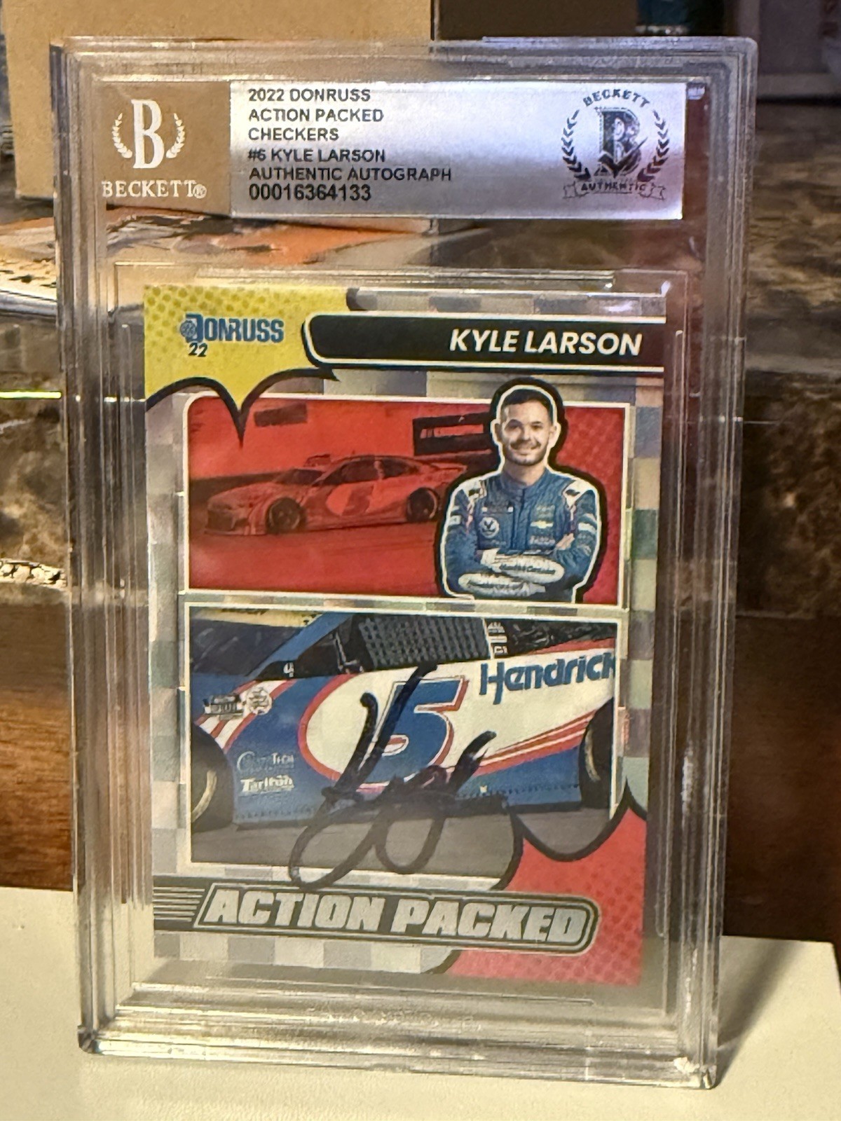 2022 Donruss NASCAR Kyle Larson Action Packed Checkers #6 Beckett Encap