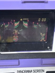 Original Game and Watch Disney Mickey Mouse handheld System.