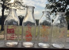 Lot Of Four Early Milk Bottles