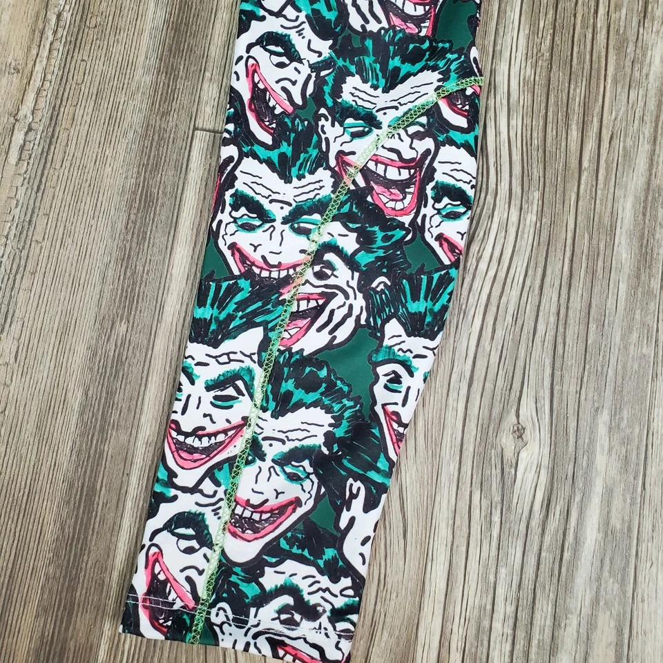 Mujer Moda Joker Cara Leggings Estampados con 2 Bolsillos Verde Negro Rojo S/M 27 pulgadas Foto 3 de 4