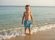 Boys Turquoise Cow Print Swim Trunks: Western Cowhide Shorts