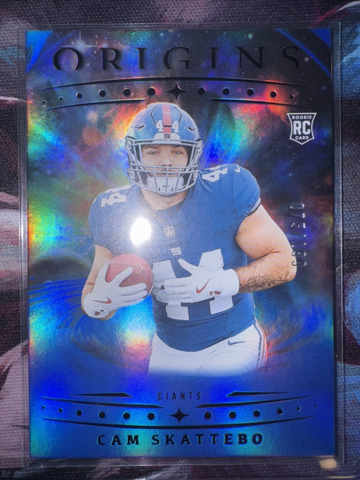 2025 Panini Origins - Cam Skattebo, Cam Skattebo #123 Holo Blue /199 Color Match