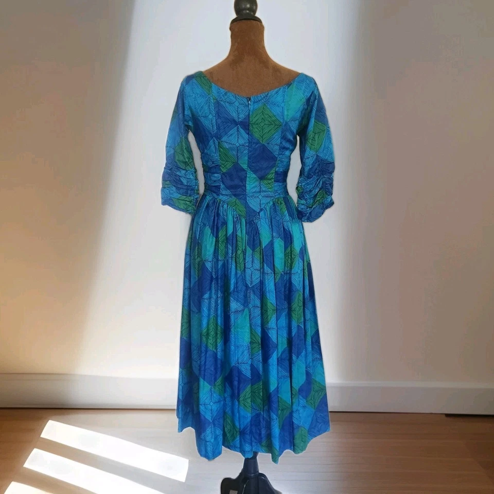 Vestido Topsey Originals Años 50 Azul Verde Ajuste Geométrico y Manga Acampanada Acanalada De Colección Foto 2 de 4