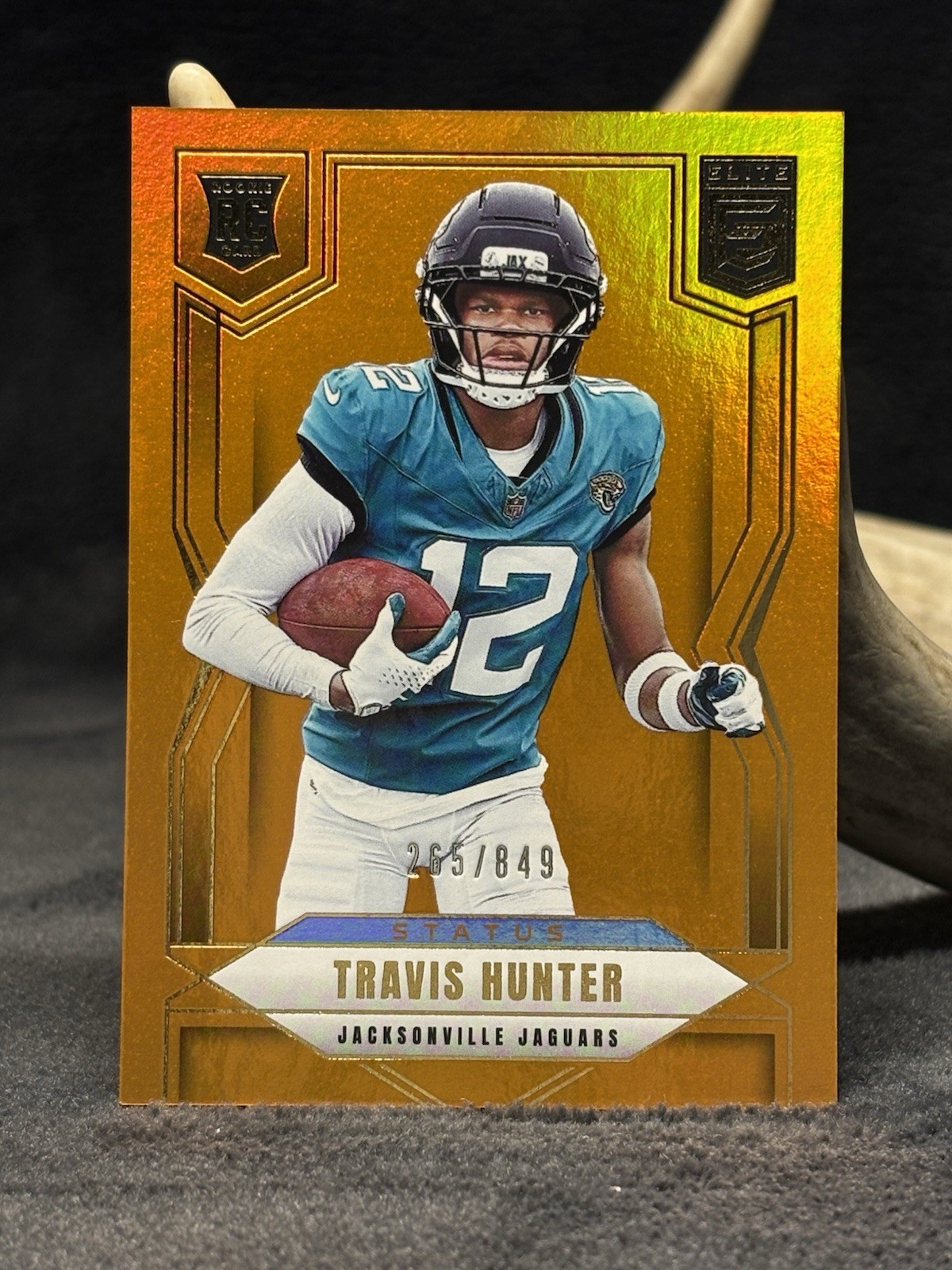 2025 Donruss Elite - Rookies Travis Hunter #114 Status Metallic Orange /849 (RC)