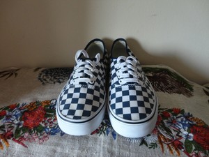 vans checkerboard tie up