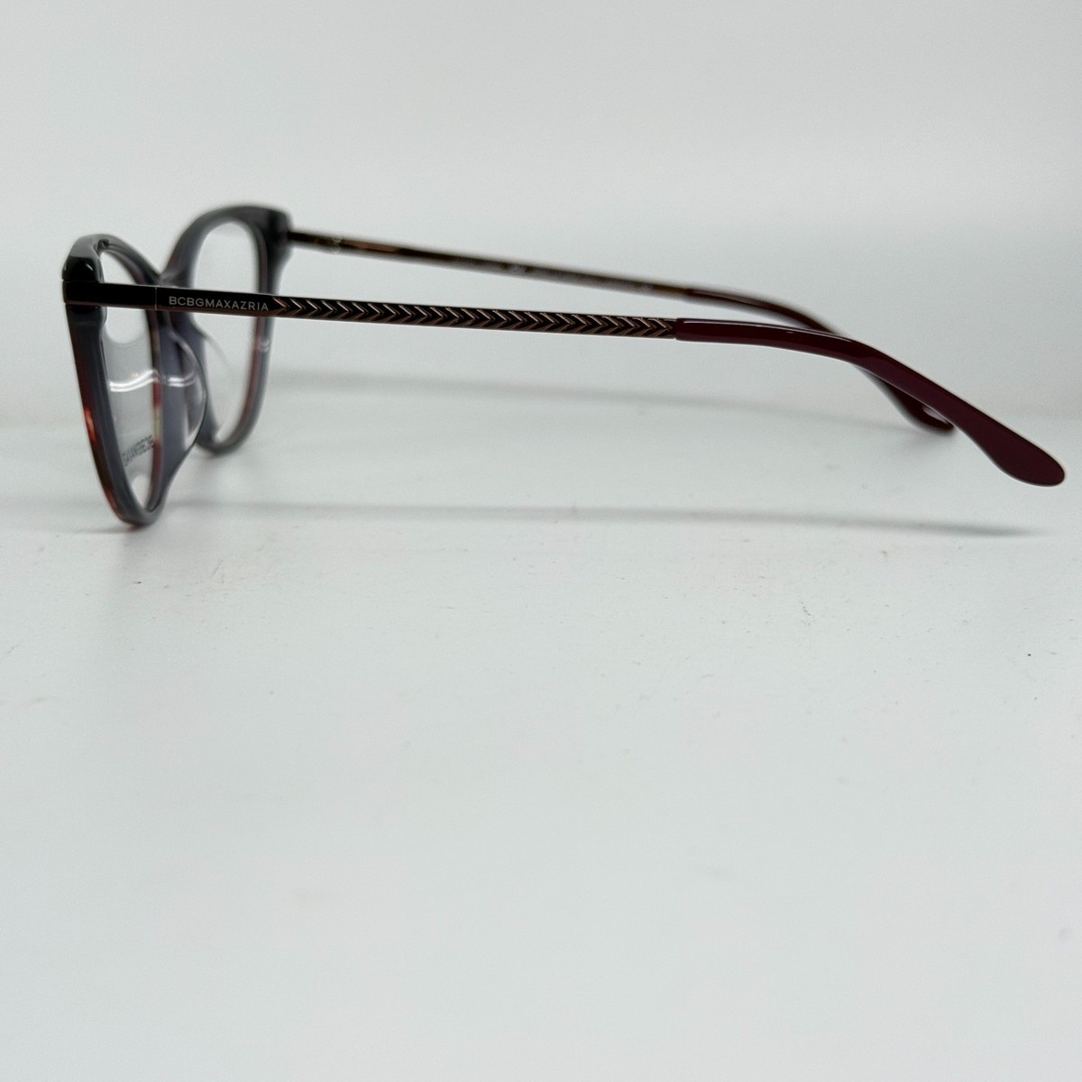 BCBGMAXAZRIA Enticing‎ Black Cat Eye Sunglasses Polarized Rose Gold Frame 21290 BCBGMAXAZRIA Womens Rose Gold Metal Cat Eye Eyeglasses  main image 2