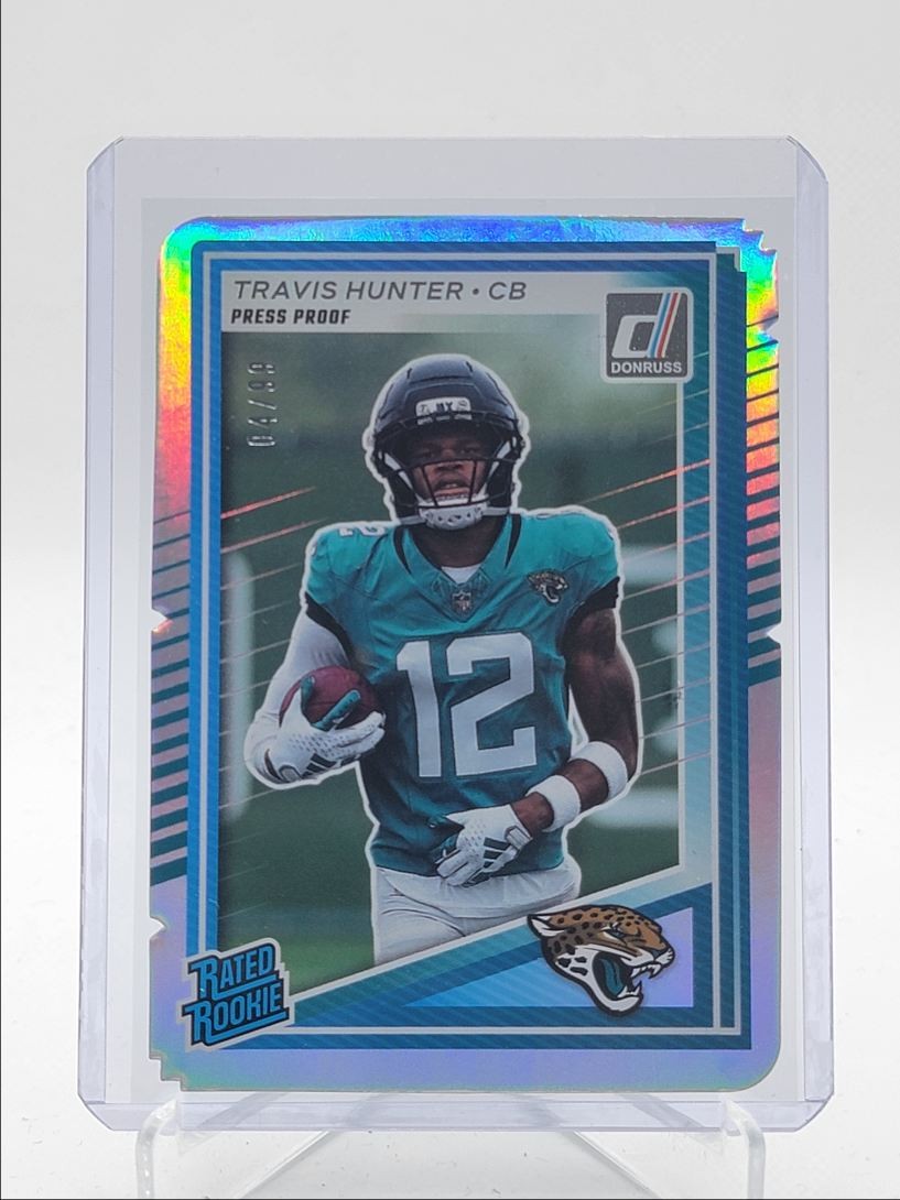 TRAVIS HUNTER 2025 DONRUSS RATED ROOKIE PRESS PROOF SILVER DIE CUT /99 Q5692