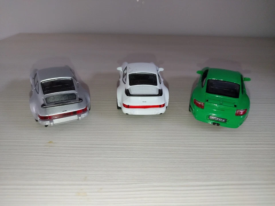 Lotto 3 Modellini Porsche 911 Welly 1/39 Vedi Foto No Burago Majorette Solido - Immagine 2 di 4