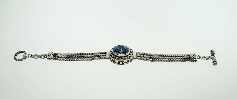 Brazalete Samuel Benham plata esterlina oro amarillo 18k topacio azul Londres palanca Foto 3 de 4