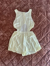 Lush lemon yellow romper with cut out details and gold buttons size M