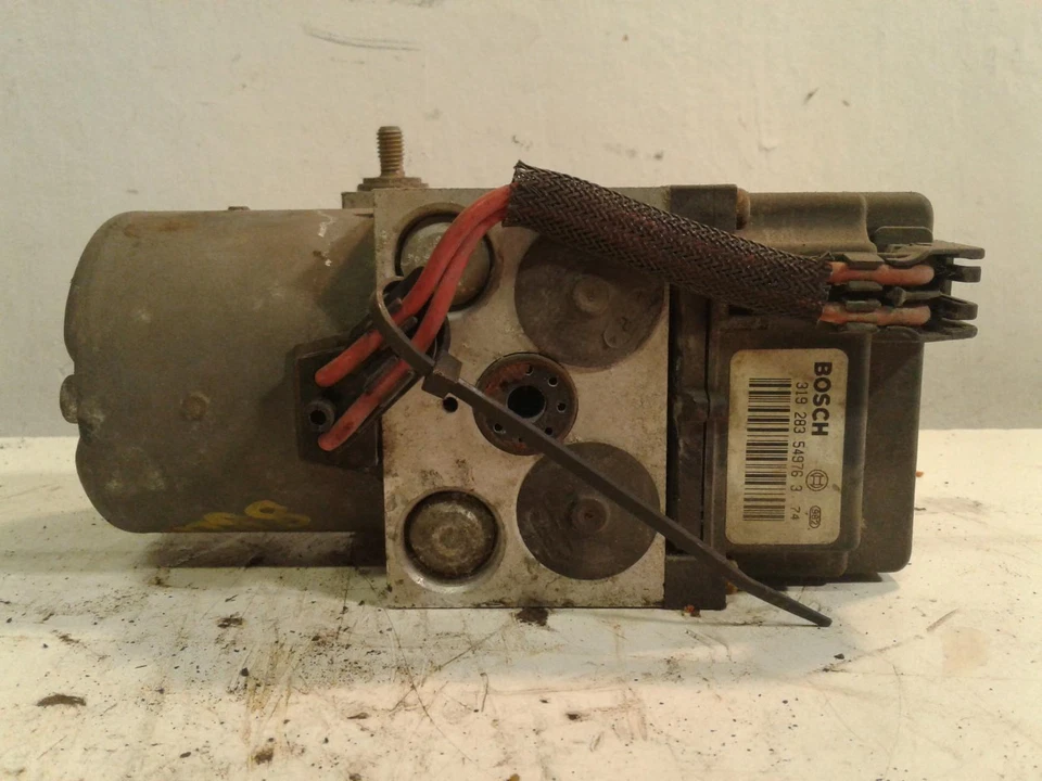 Conjunto de bomba y motor ABS usado se adapta a: Saturn serie L 2002 grado de montaje Foto 4 de 4