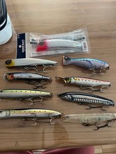 Retired blue fish plugs