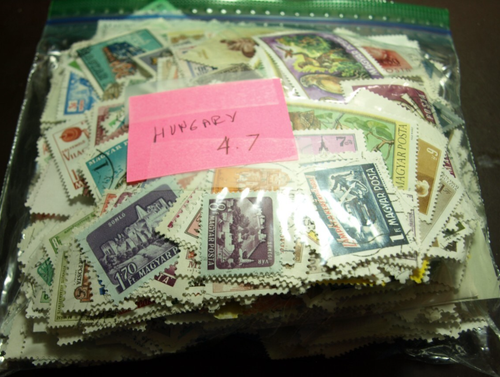 4.7 OUNCES HUNGARY STAMPS OFF PAPER UNCHECKED