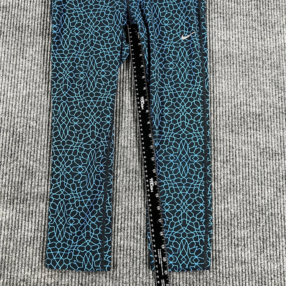 Calça de corrida Nike Dri-FIT feminina pequena azul estampa geométrica detalhes reflexivos - Imagem 4 de 4