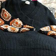 BiBi V-Neck Sweater in Black and Orange with Floral Accents