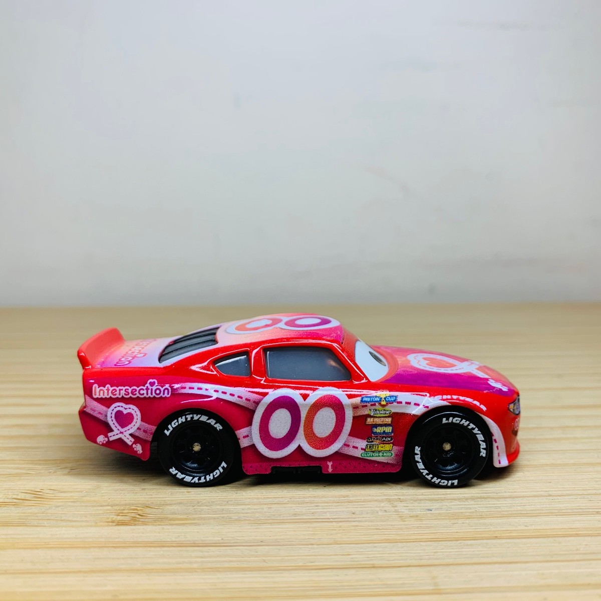 Disney Pixar Cars - Jimmy Cables Pink Intersection 00 Piston Cup