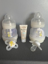 2 x New Mam baby bottles & 2 X new born Dummies. Size 0 Teats.
