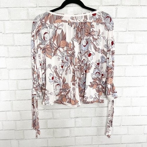 Free People blusa bianca con ritagli floreali e cravatte sulle maniche donna taglia XS - Foto 3 di 7