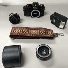 Nikon EM 35mm SLR Film Camera w/Nikon 50mm f/1.8 Lens  Super Albinar 2x Working