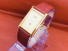 Vintage Seiko Quartz Slim Tank White & Golden Dial Leather Band Wrist Watch