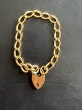 Victorian 18ct gold charm / locket / curb bracelet 28 gms (all hallmarked)