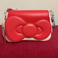 HER UNIVERSE SANRIO HELLO KITTY RED BOW BAGUETTE BAG NWT!!!!