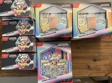 PRISMATIC EVOLUTIONS EEVEE POKEMON LOT: SURPRISE BOX, BINDER & POSTER COLLECTION