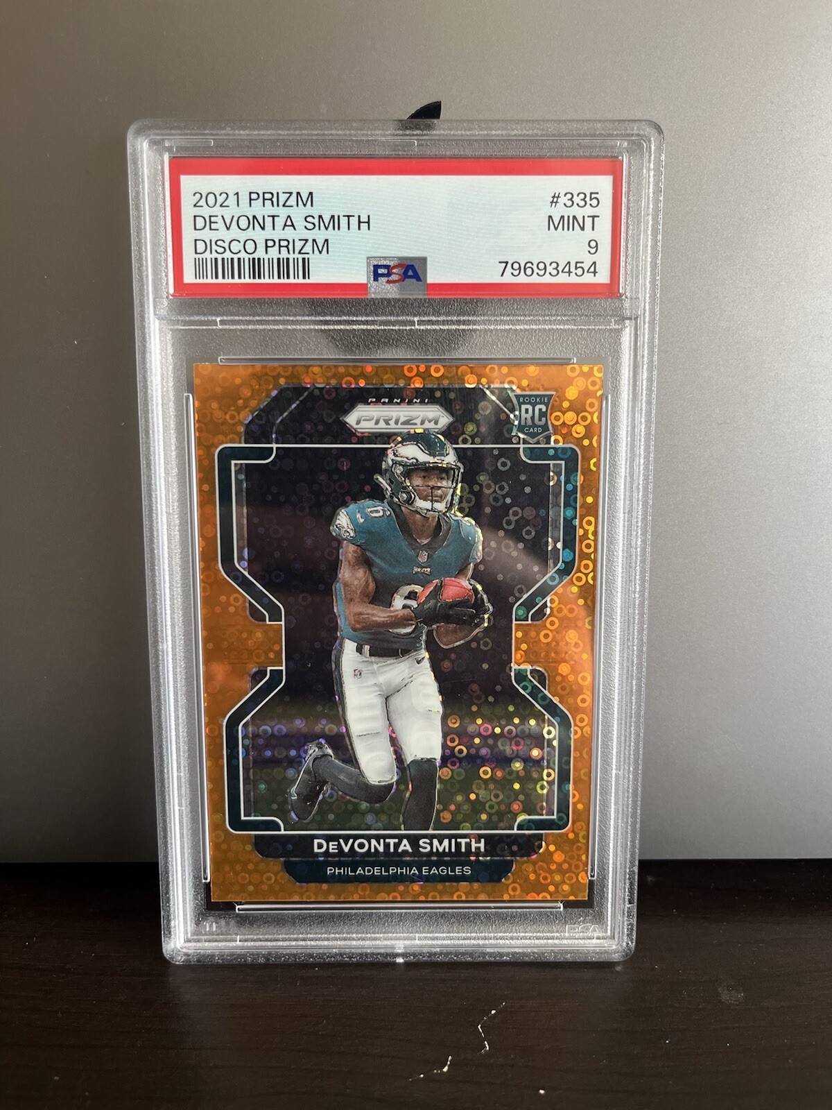2021 Panini Prizm - Rookie Orange Disco Prizm #335 Devonta Smith (RC) PSA 9