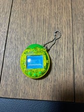 Tamagotchi Osutchi Clear Green Handheld Virtual Pet
