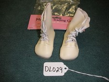 Pair of Monique Light Cream Lace Up Doll Boots Style 796 75mm DL029