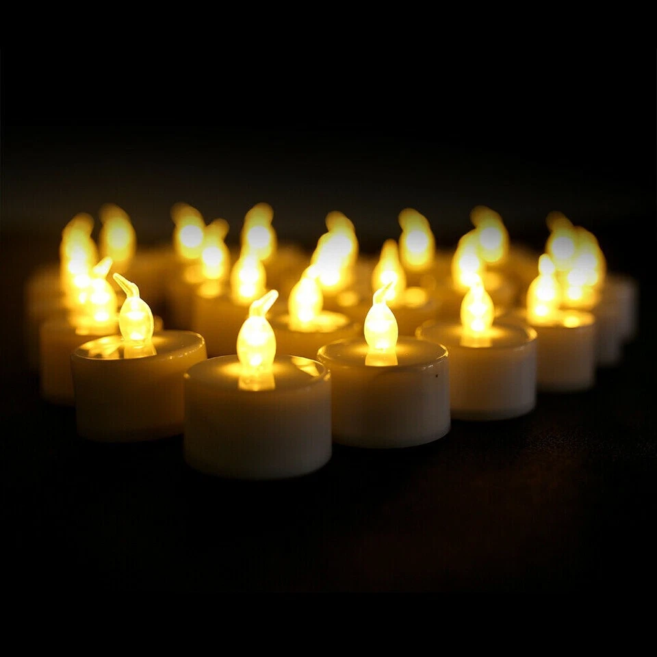 Paquete de 48 velas de luz de té LED flamíferas en amarillo cálido parpadeante que funcionan con pilas Foto 2 de 4