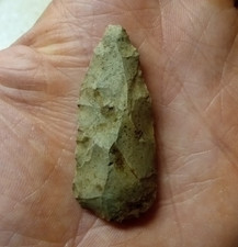 Old Arrowhead Carved Out Of Stone