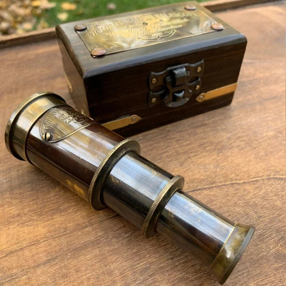 Full brass Victorian-style spyglass in a wooden presentation box — the kind of desk object that makes visitors pick it up immediately.