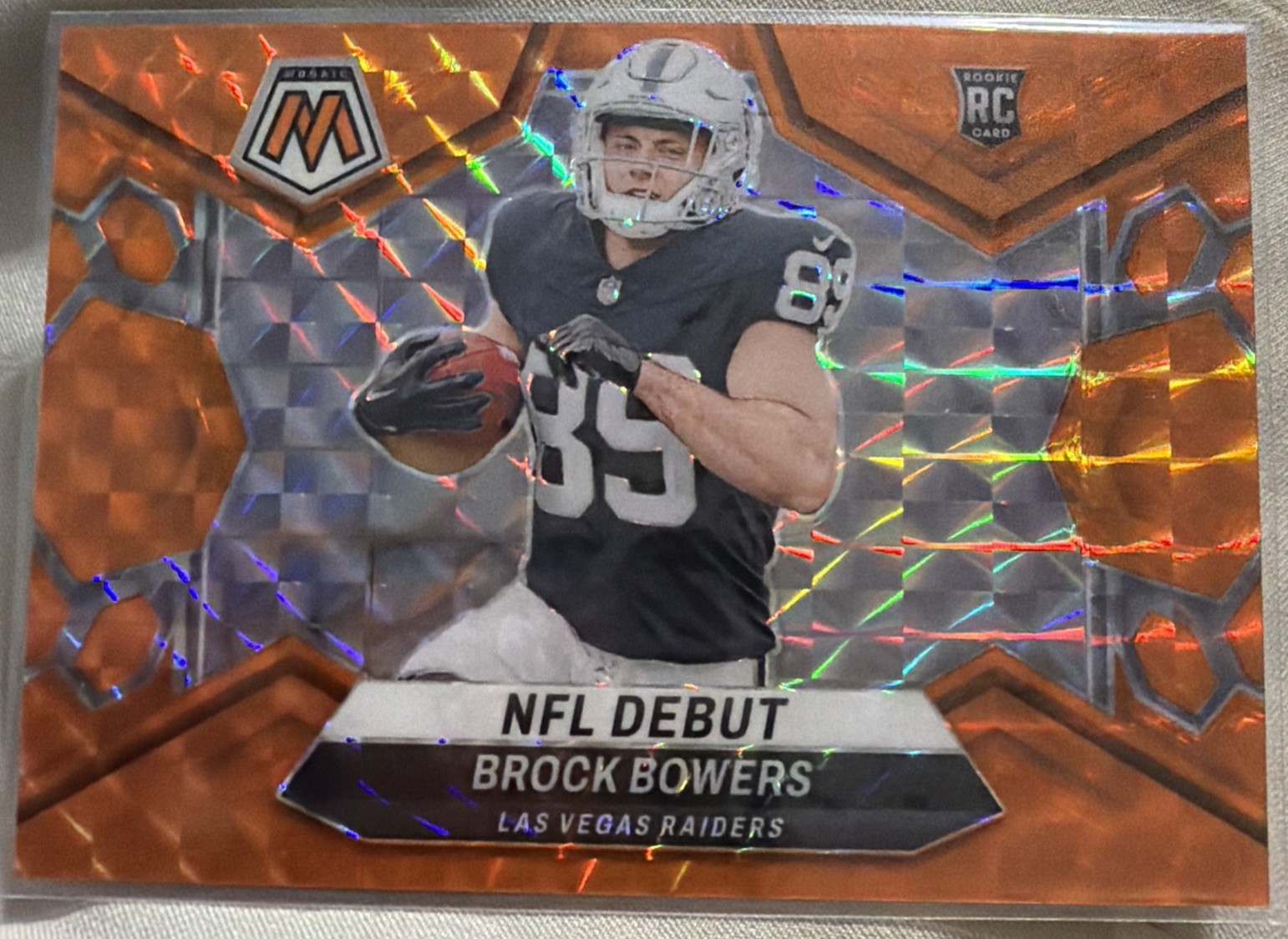 2024 Panini Mosaic - NFL Debut - Brock Bowers - Orange Mosaic #286 /199 (RC)