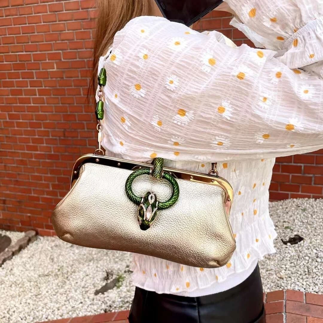 Gucci bag with snake best sale buckle