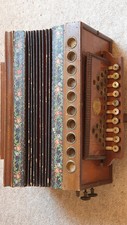 Very old 1 row diatonic button accordion w. 3 couplers at the side