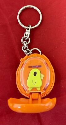 Vintage 1997 McDonalds Happy meal ￼Toy - Tamagotchi - Orange