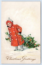 1913 Christmas Postcard- Little Girl in Hat and Red Coat Pulling Holly Thru Snow