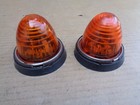 Deux feu orange SEIMA forme obus en verre pour feu clignotant , avec semelle .