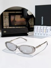 Chanel 5565 Transparent Gray Temple Sunglasses with Letter Logo 54 17-140