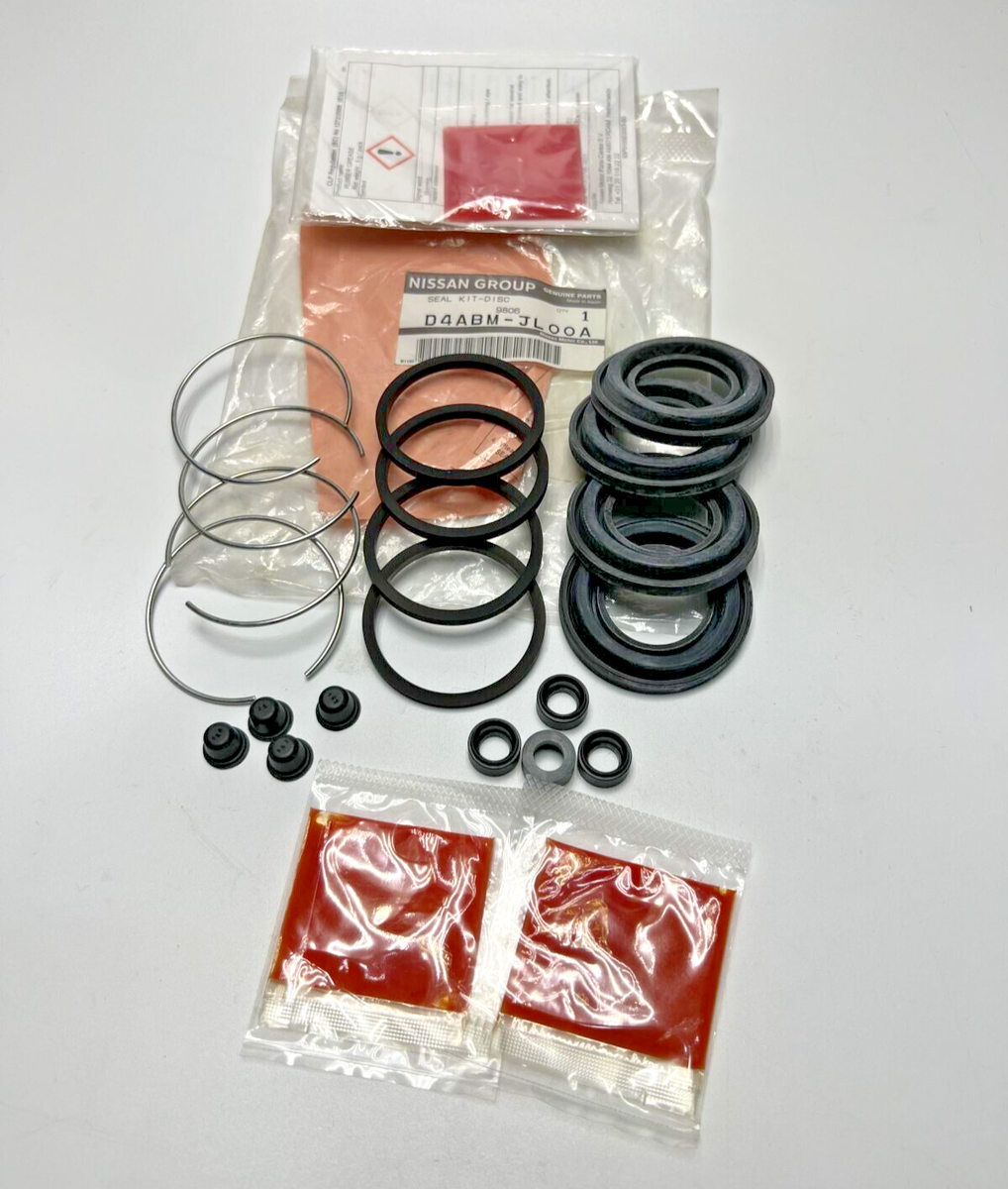 Genuine OEM Nissan Rear Akebono Caliper Rebuild Seal Kit P/N D4ABM