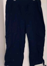 Chicos Women's Zenergy Capri Pants Size 2 With Cargo Pockets And Ties At Legs