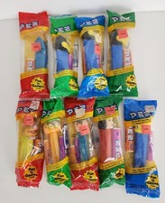 Lot of 9 Vintage Pez Dispensers Sealed in Packaging Daffy Duck Garfield Batman