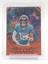 TRAVIS HUNTER 2025 ORIGINS ROOKIE HOLO ORANGE /299 #142 JAGUARS FOOTBALL Q7038