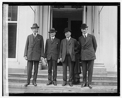 Photo:Four unidentified men outside building,May 1922 1