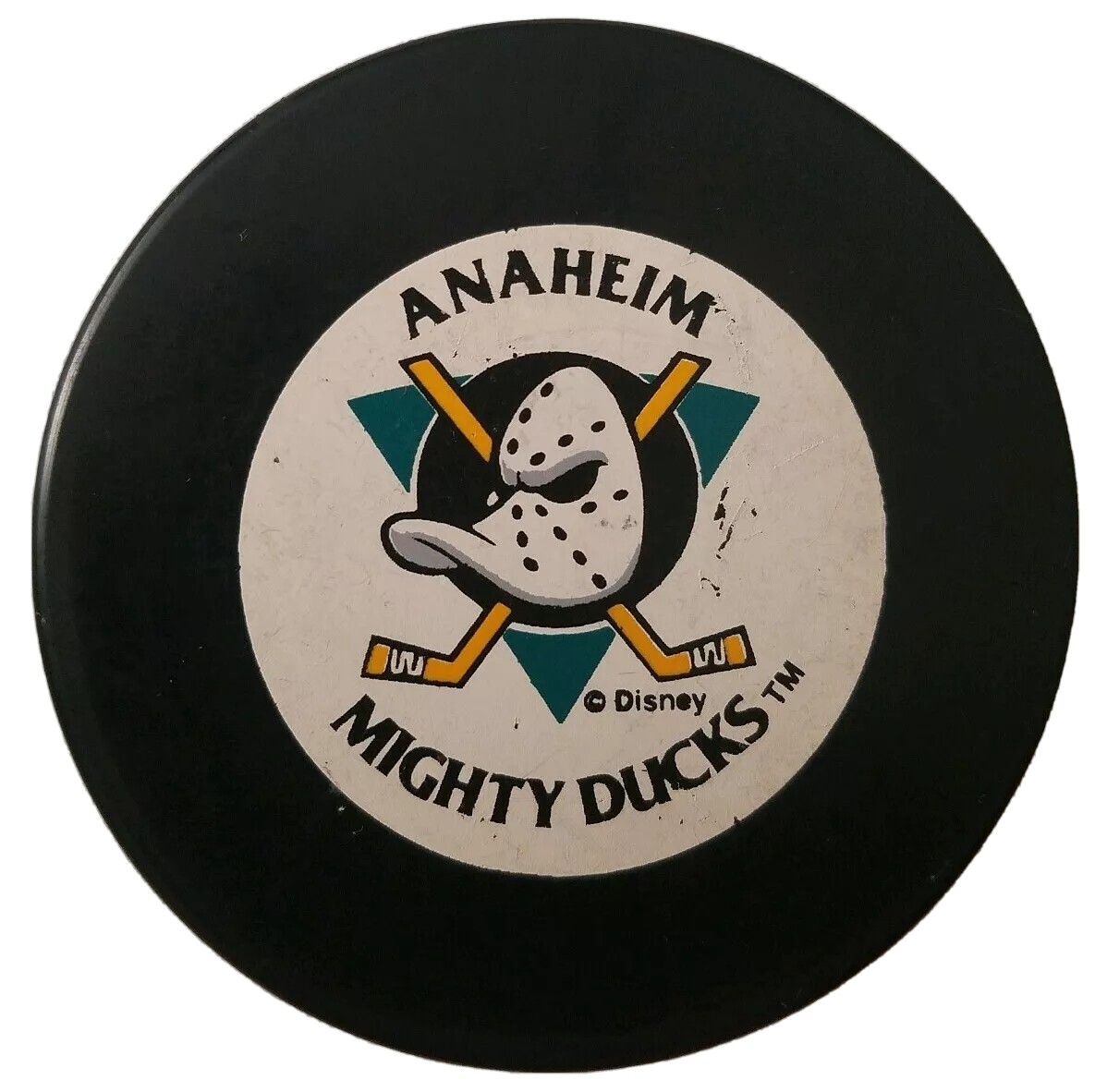 ANAHEIM MIGHTY DUCKS NHL VINTAGE OFFICIAL TRENCH MFG. PUCK disney