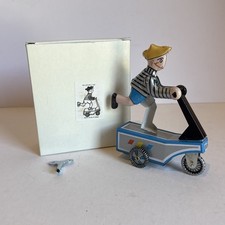 Mechanical Tin Lithograph Wind-Up Boy On A Scooter With Key