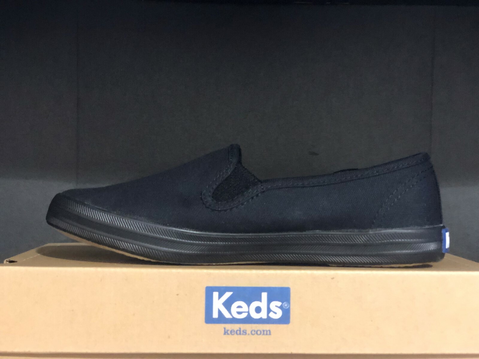 black slip on keds
