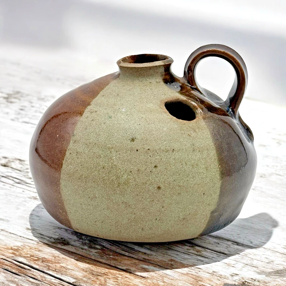 Candelabro en forma de jarra de gres de cerámica artística candelabro marrón lazo para dedos Foto 2 de 4