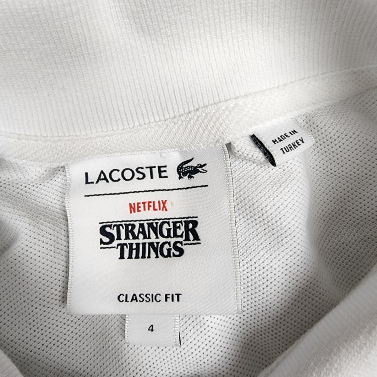 Lacoste X Stranger Things Netflix Series White Polo Demogorgon